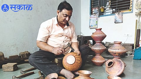 Bipin Kasar making copper urns