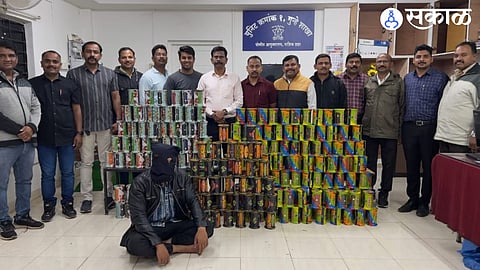 Police Inspector Vijay Dhamal of Unit One of the City Crime Branch along with the seized nylon manja worth two lakhs and the suspect.