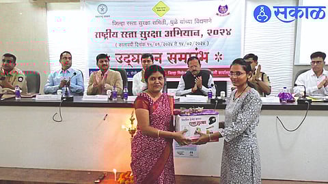Helmets were distributed to women at the inaugural program of the 34th National Road Safety Campaign