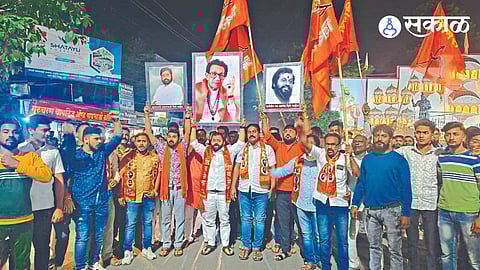 Shiv Sena workers cheering while welcoming the result given by the Assembly Speaker.