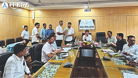 MLA Satyajit Tambe in discussion with education officer of primary and higher secondary department.