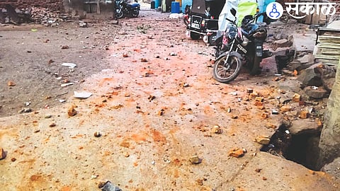 A pile of stones fell on the road after the stone pelting by the social activists.