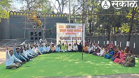 The entire Maratha community on a fast on Wednesday near the statue of Chhatrapati Shivaji near the central bus stand.