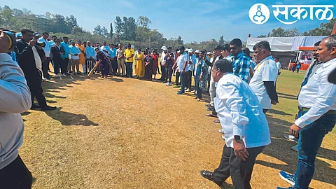 MLA Devyani Farande inaugurating the Namo Cup cricket tournament by batting. Along with various dignitaries.
