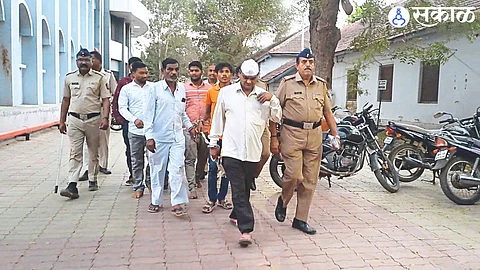 Police taking life-imprisoned accused in the Rainpada murder case to the district jail.