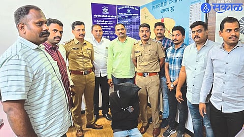 Police team with arrested suspect