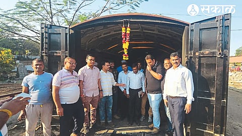 Railway officials and staff loading four-wheelers from Deolali Camp Railway Station to Chandigarh.