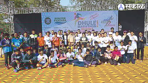 Dignitaries present with the winners of the Dhule Marathon at the police drill ground.