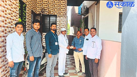 Municipal team collecting dues from defaulters in property tax collection drive on Monday.