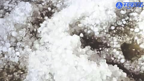 Hail falling in stormy rain.