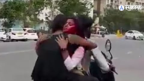 Noida police fined girls kissing on Bike