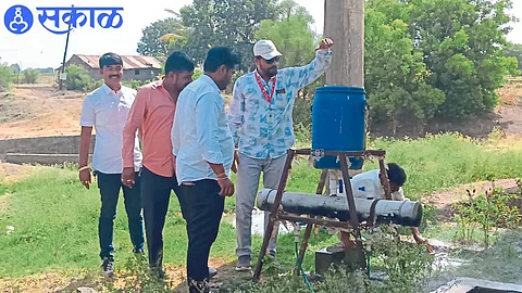 Santhosh Khalkar, health worker taking OT test of drinking water.