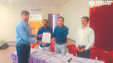 Additional Chief Executive Officer of Zilla Parishad Arjun Gunde, Deputy Chief Executive Officer Ravindra Pardeshi, Primary Education Officer Dr. Nitin Bachhao while giving appointment order to teacher Umesh Suryavanshi after posting through counseling.
