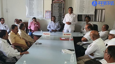 Rajaram Pangavane speaking at the meeting held for the preparation of road show of NCP President Sharad Pawar and Rahul Gandhi. Sarpanch Bhaskarrao Bankar, Dilip More and others are neighbors.
