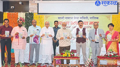 From the left, Dr. Sudhir Sanklecha, Vijay Raut, Suresh Bhatewara, Raosaheb Kasbe, Minister Chhagan Bhujbal, Mahesh Zagde, Author Dr. Kailas commode and Mangala commode.