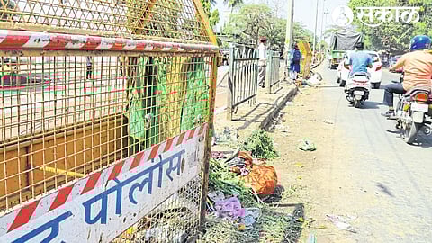 Garbage dumped in the middle of the road.