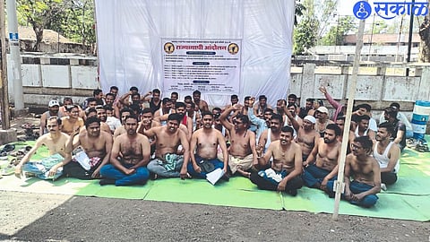 Contractual electricity workers stage a half-naked protest in front of Cummins Club on Tuesday for various pending demands.
