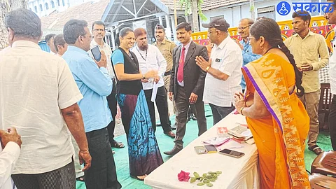 District and Sessions Judge Madhuri Anand while interacting with municipal officials present for settlement of property tax cases in the National Lok Adalat.