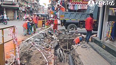 Excavation of paved roads on the city's main road on Friday.