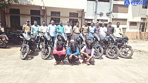 Police officers and team present after action in vehicle theft case.