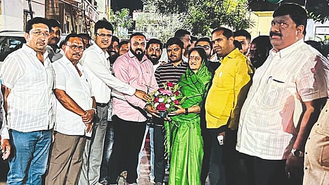 While welcoming Smita Wagh, former taluka president of NCP, Prof. Manoj Patil