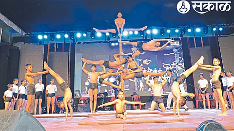 Athletes doing yoga demonstrations and Mallakhamb exercises on Saturday at the Mahasanskrit Mahotsav.