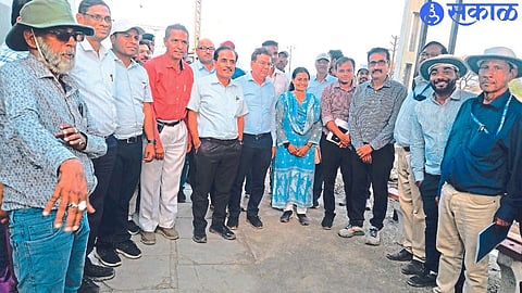 Senior officials and staff while inspecting the railway line.