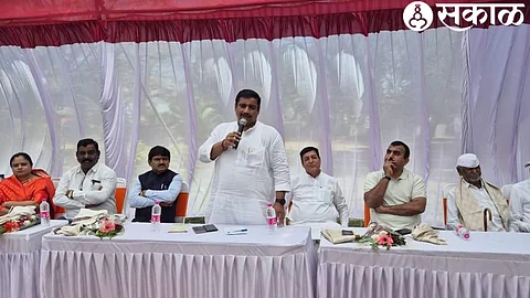 MLA Rahul Dhikle speaking at the commencement of development works worth four crores in Ward Two in Adgaon. dignitaries with