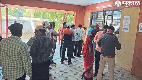 Queue of citizens to pay property tax, water bill in municipal corporation on Sunday.