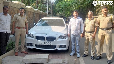 A used BMW car with number changed. together with
Gangapur Crime Squad.
