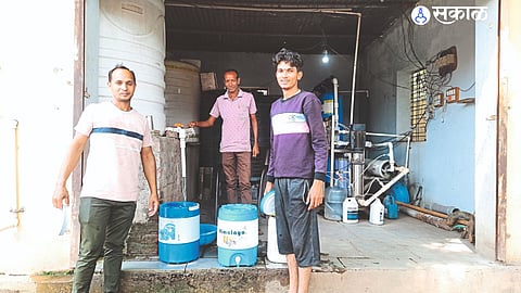 Villagers and employees came to the RO plant for pure and cold water.