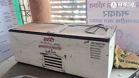 Coffin lying in disrepair in municipal parking lot