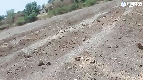 Burai riverbed in the outskirts of the village is being plowed with JCB machines.