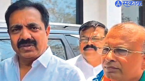 Nationalist Congress Sharad Pawar faction's candidate from Raver constituency Sriram Patil with party state president Jayant Patil.