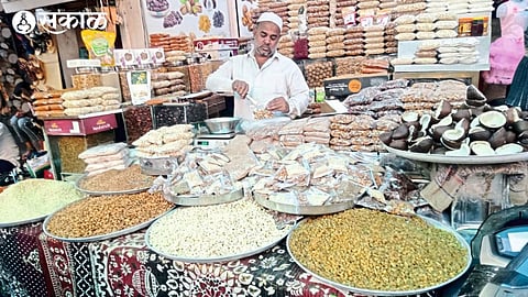 A businessman selling dry fruits on Mohammad Ali Road in Malegaon.