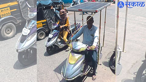 Solar panel mounted on bike by Javed Sheikh