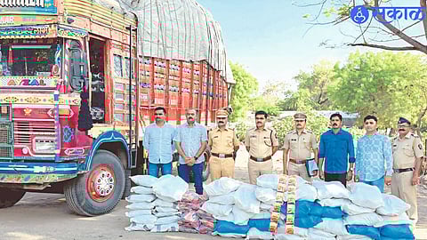 Taluka police station team present with suspects in Gutka smuggling case.