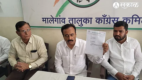 While showing the resignation letter, Dr. Tushar Shewale, along with Vikram Pawar and Sudhakar Nikam