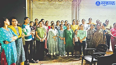 Local citizens gathered outside the closed bar and restaurant in Wadala-Pathardi area.