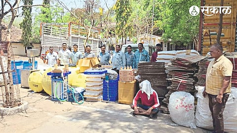 Squad with confiscated materials of fake brewery.