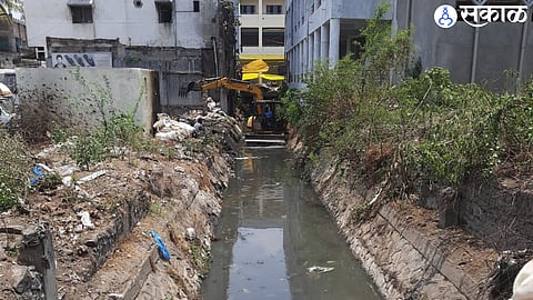 Ongoing drainage cleaning by JCB.