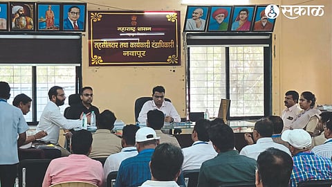 While guiding the meeting at Nawapur Tehsil Office, Dr. Vishwanath, Police Observer Kumar Gautam, Tehsildar Prashant Kulkarni and Zonal Officer.