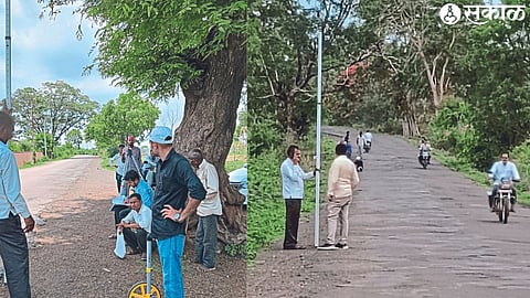 Employees of Public Works Department taking level measurements before repair of Chhail Road.