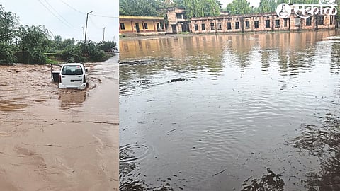 A car stuck in flood water. In the second photo, the water accumulated in the playground of the municipal school in the city