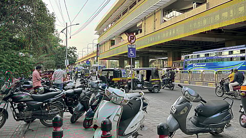Metro Passenger Two Wheeler on Footpath