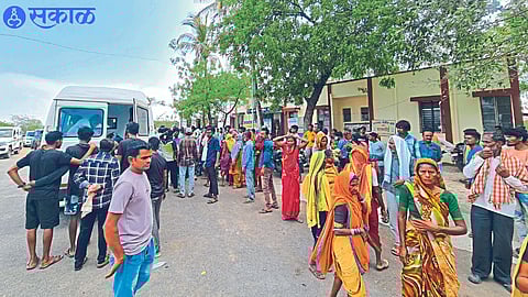 An angry crowd gathered at the police station here. The second photo shows the police presence in the village.