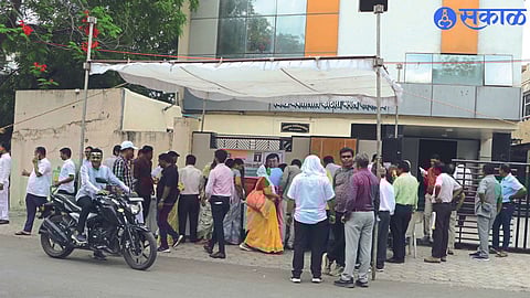 R. R. Barricades placed on the road leading to the school. Congestion in polling station area.