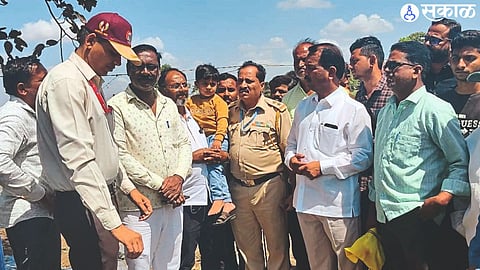 Newly elected MP Bhaskar Bhagre while inspecting the farm damaged by 'Sukhoi' on Wednesday.