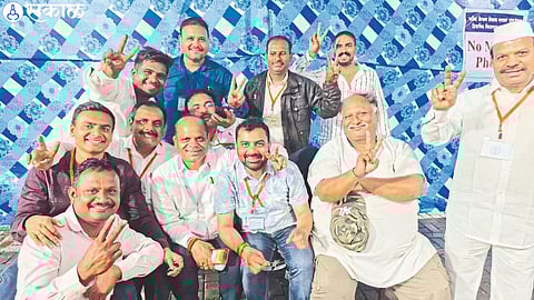 Kishore Darade expressing happiness with his supporters for winning the MLA election for the second time.