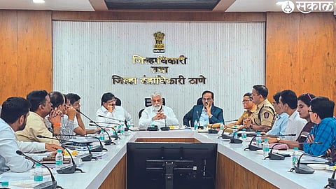 Officials along with Nashik Guardian Minister Dada Bhuse during a meeting at the Thane Collector's Office to find a solution to the traffic jam on the Nashik-Mumbai highway.